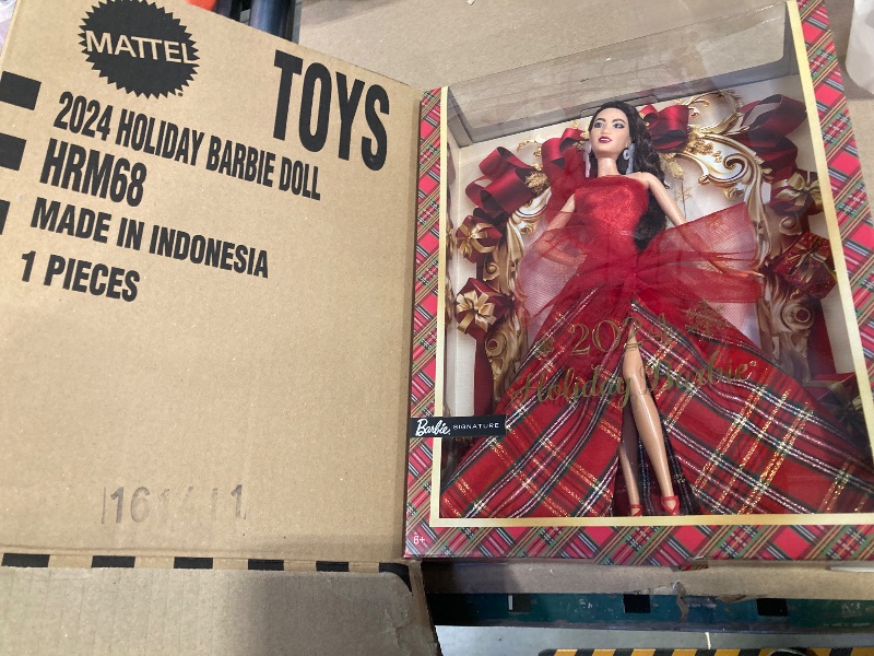 Photo 2 of Barbie Signature 2024 Holiday Dolls, Seasonal Collector Gift, Plaid Gown with Red Bow, Displayable Packaging, Dark Brown Hair