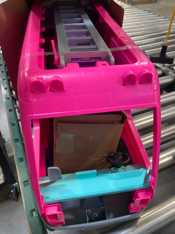 Photo 4 of Barbie Camper Playset, DreamCamper Toy Vehicle with 60 Doll-Sized Accessories Including Furniture, Pool & 30-inch Slide