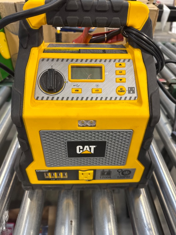 Photo 4 of Cat Power Station with 1,200-Peak-Amp Jump Starter, Tire Compressor, and Power Inverter, CJ1000DXT
