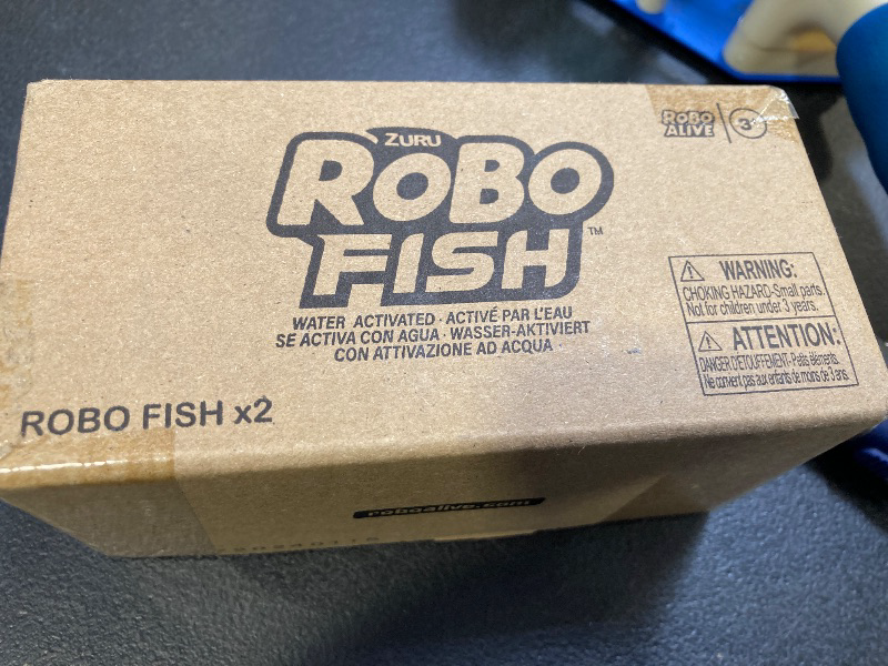 Photo 2 of Robo Alive Robo Fish Robotic Swimming Fish (Teal + Orange) by ZURU Water Activated, Changes Color, Comes with Batteries, Amazon Exclusive (2 Pack) Series 3