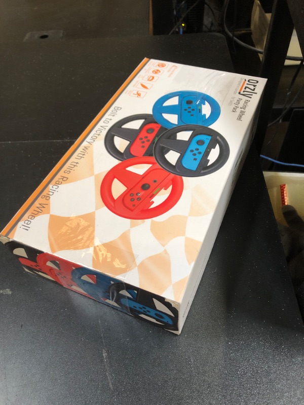 Photo 1 of Orzly Nintendo Switch & OLED Console Steering Wheel, 4 Pack, for Mario Kart 8 Deluxe Nintendo Switch, Mariokart Switch Steering Wheel (Joycon Controller Attachments) (2X Black, 1x Wheel, 1x Red)