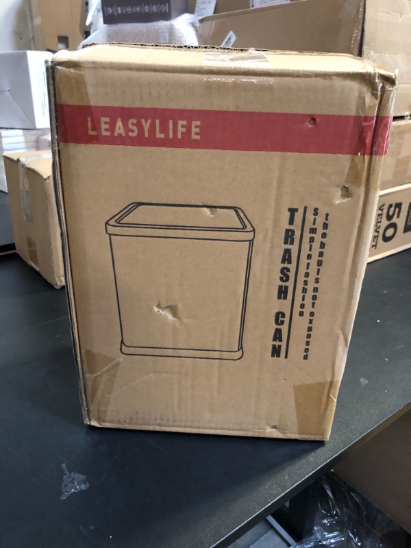 Photo 1 of LEASYLIFE10L/2.6GAL Metal Trash Can with Swing Lid, Rectangular Bathroom Garbage Can, Modern Narrow Trash Can for Bathrooms, Bedrooms, Offices, Laundry Rooms (White Stripe)