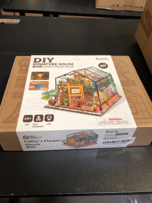 Photo 2 of Rolife DIY Miniature House Kit Greenhouse, Tiny House Kit for Adults to Build, Mini House Making Kit with Furniture, Halloween/Christmas Decorations/Gifts for Family and Friends (Cathy's Greenhouse)