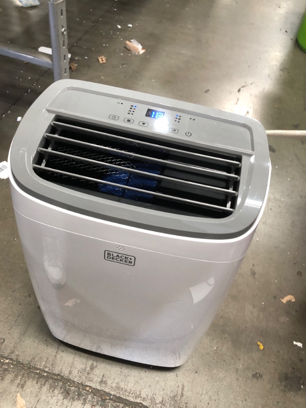Photo 1 of *POWERS ON** BLACK+DECKER 10,000 BTU Portable Air Conditioner for Rooms up to 450 Sq. with Remote Control, White