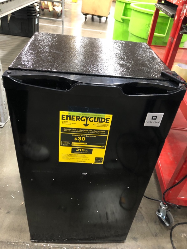 Photo 1 of (for parts/ turns on )  POWERS ON** Arctic Chef 3.2 Cu. ft. Compact Refrigerator with Eraser Board Door, RFR326, Black