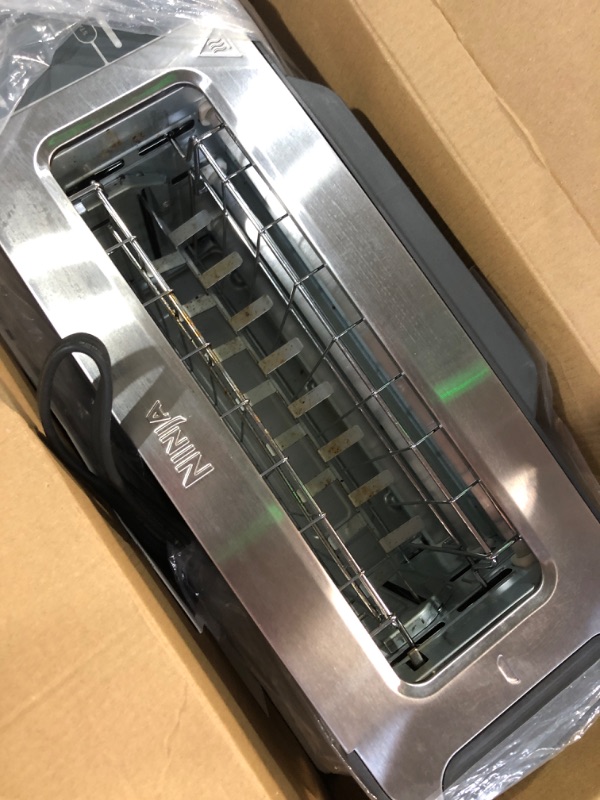 Photo 1 of (see all images) Ninja ST101 Foodi 2-in-1 Flip Toaster, 2-Slice Capacity, Compact Toaster Oven, Snack Maker, Reheat, Defrost, 1500 Watts, Stainless Steel, 6 Functions