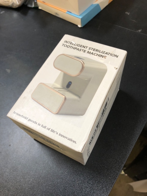 Photo 1 of Automatic Toothpaste Dispenser,Wall Mounted Electric Toothpaste Dispenser with 3 Toothpaste Slots,Toothpaste Dispenser for Kids and Adults (Black)