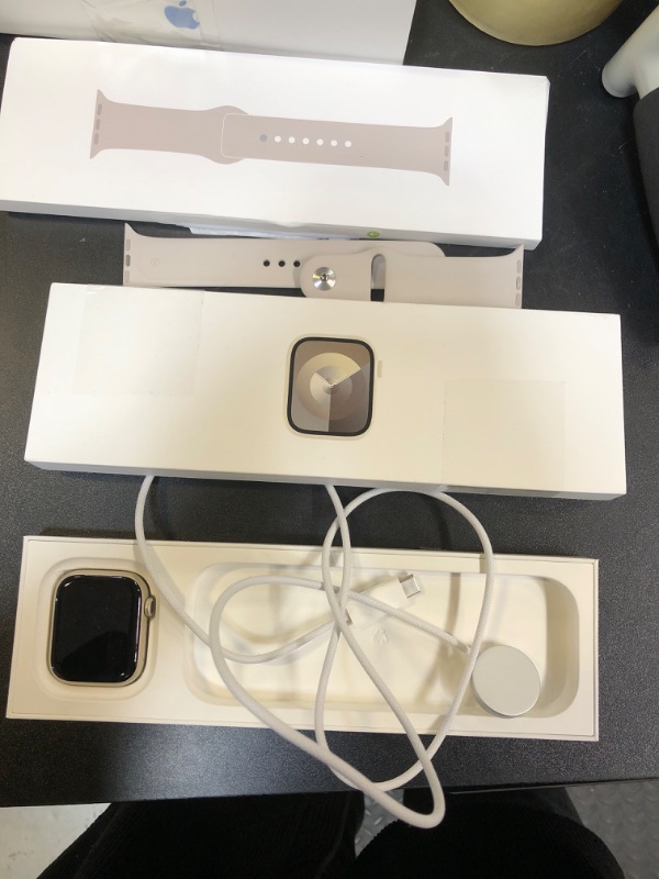 Photo 2 of Apple Watch Series 9 [GPS 45mm] Smartwatch with Starlight Aluminum Case with Starlight Sport Band M/L. Fitness Tracker, ECG Apps, Always-On Retina Display, Water Resistant