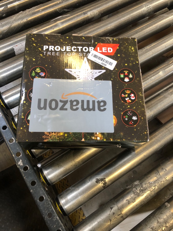 Photo 1 of Christmas Tree Topper Lighted with 6 Projection Modes,Christmas Star Tree Topper Built-in LED Rotating Projector Lights 3D Sparkling Christmas Tree Decorations for Xmas Party Holiday Decor(Sliver)