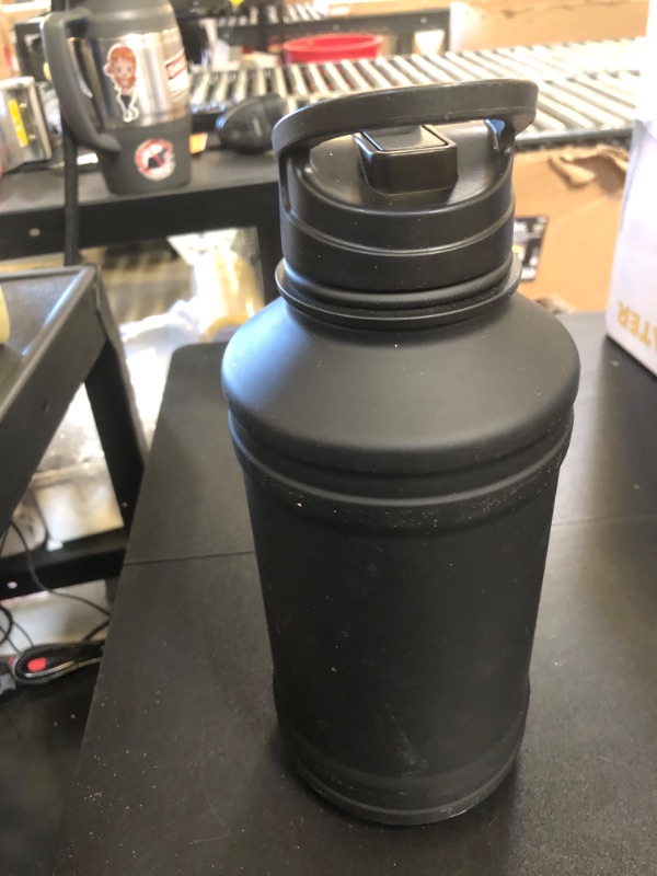 Photo 1 of Gym Keg Premium Stainless Steel Water Bottle Black - 74oz / 2.2L - Leak-Proof, Large Capacity - Ideal for Gym, Hiking, Sports - Eco-Friendly, Durable Design for Active Lifestyles