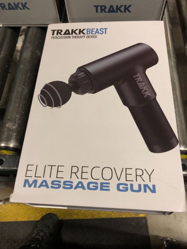 Photo 1 of TRAKK Beast Deep Tissue Percussion Massage Gun, Rechargeable Handheld 6 Speed Cordless Massager, 4 Interchangeable Heads (Black)