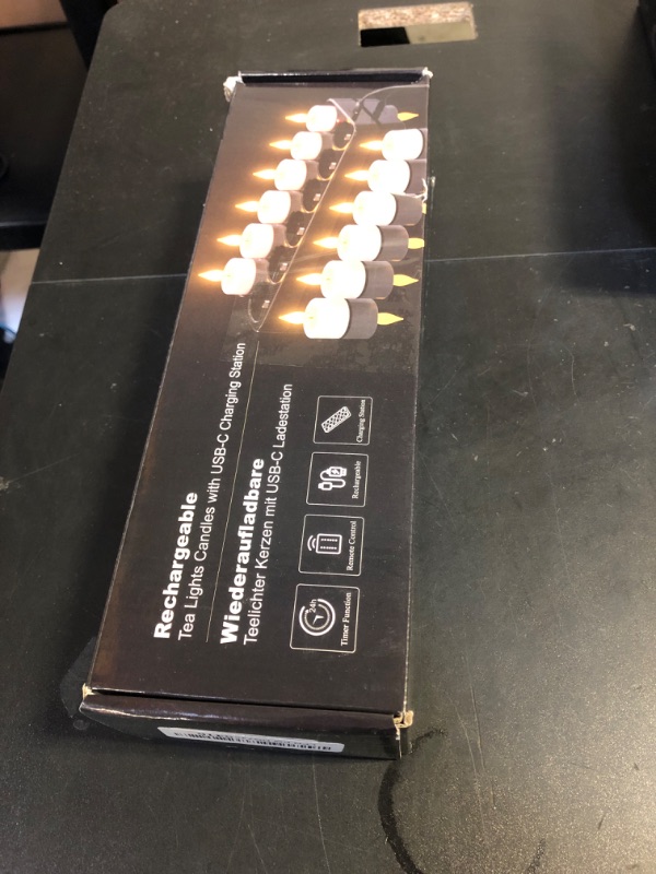 Photo 1 of Yme Rechargeable Tea Lights Candles with Charger Storage Base, 12 Pack Battery Operated LED Flameless Tealight Candles with Remote Timer for General Fireplace Halloween Pumpkins Christmas Party Decor