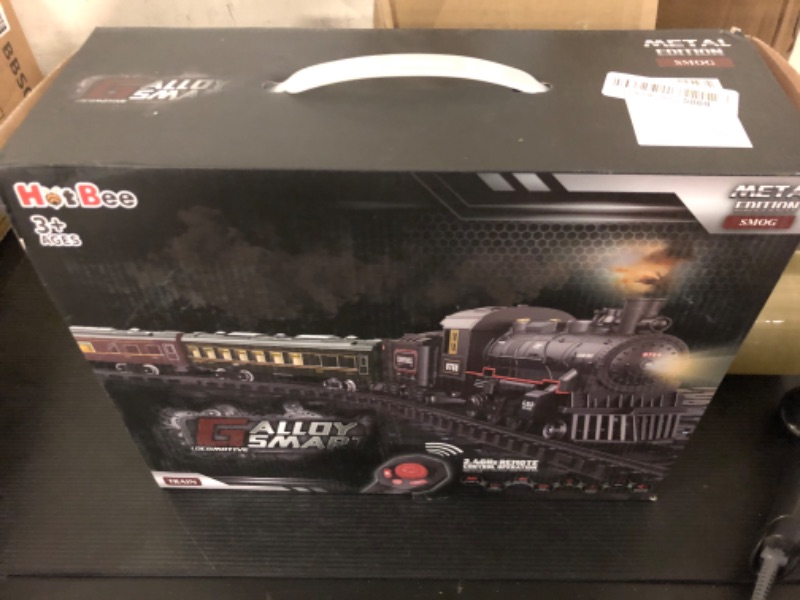 Photo 1 of Hot Bee Train Set, Remote Control Train Toys with Luxury Track & Glowing Passenger Carriages, Metal Christmas Tree Train with Smoke, Light and Sound, Toy Train Set for 3 4 5 6 7+ Years Old Boys Gifts