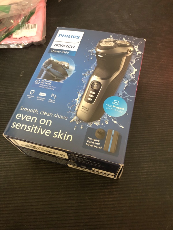 Photo 2 of Philips Norelco Shaver 3900, Rechargeable Wet & Dry Electric Shaver with Pop-up Trimmer, Charging Stand, Travel Storage Pouch, Protective Cap, Space Gray, S3341/92