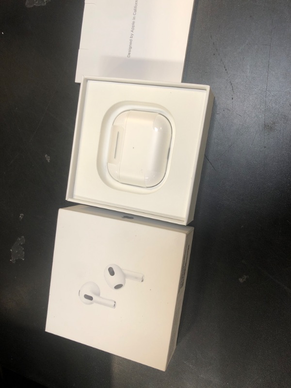 Photo 2 of Apple AirPods (3rd Generation) Wireless Earbuds with MagSafe Charging Case. Spatial Audio, Sweat and Water Resistant, Up to 30 Hours of Battery Life. Bluetooth Headphones for iPhone