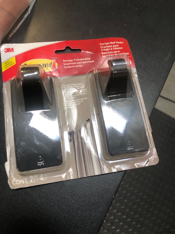 Photo 1 of Command 10 lb Matte Black Curtain Rod Hooks, 2 Hooks and 4 Command Strips, Damage Free Curtain Hooks for Hanging Curtain Rods with Adhesive Strips, No Drilling Home Decor and Room Decor