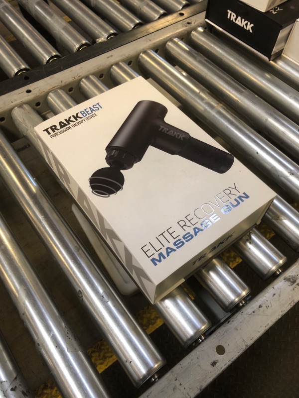 Photo 1 of **SOLD FOR PARTS**
TRAKK Beast Deep Tissue Percussion Massage Gun, Rechargeable Handheld 6 Speed Cordless Massager, 4 Interchangeable Heads (Black)