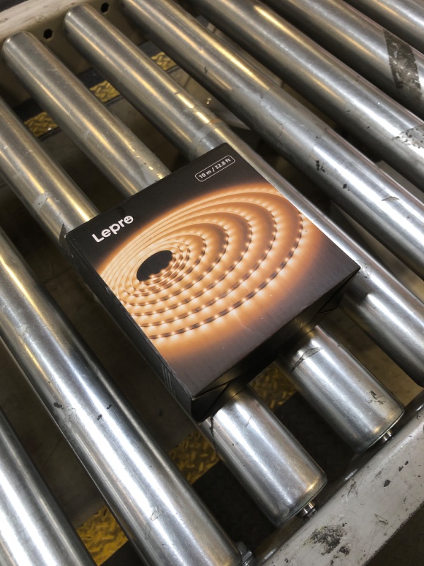 Photo 1 of Lepro LED Strip Light, 32.8Ft Dimmable Vanity Lights, 3000K Super Bright LED Tape Lights, 420 LEDs SMD 2835, Strong 3M Adhesive, Suitable for Home, Kitchen, Under Cabinet, Bedroom, Warm White