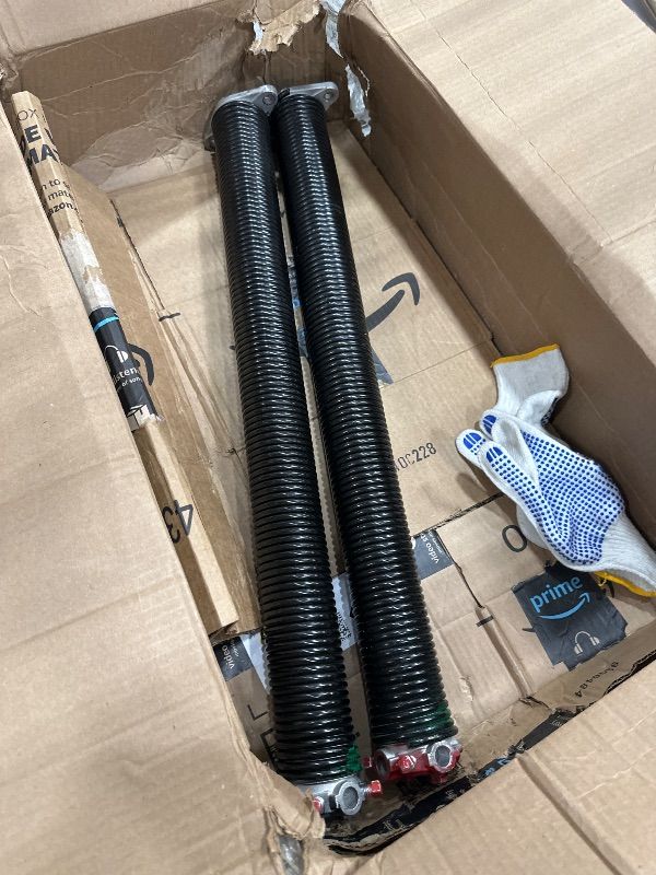 Photo 1 of ** SEE NOTES ** 
KaiMinDogz Pair of 2" Garage Door Torsion Springs Set with Non-Slip Winding Bar & Gloves,High Precision Electrophoresis Black Coated, for Replacement & Installation, MIN 16,000 Cycles (0.243x2''x26'')