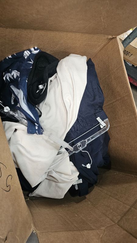 Photo 1 of ****FINAL SALE NONREFUNDABLE**** Nellis Auction Clothes Bundle Associated sizes and styles 