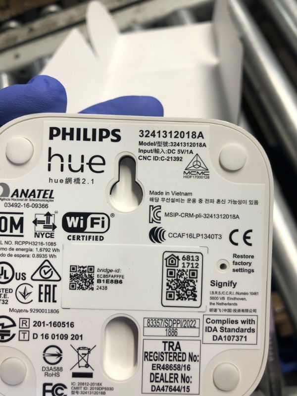 Photo 1 of **MISSING BULBS AND POWER CORD**
Philips Hue Smart Light Starter Kit - Includes (1) Bridge and (2) 60W A19 LED Bulb, White and Color Ambiance Color-Changing Light, 800LM, E26 - Control with App or Voice Assistant