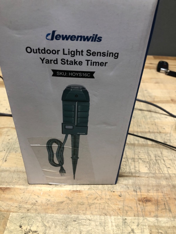 Photo 1 of DEWENWILS Outdoor Power Strip Timer with Photocell, Yard Stake Timer Dusk to Dawn, Weatherproof Countdown Light Timer, 6 Outlets 10ft Cord Timer for Lights, Garden, 1875W/15A UL Listed