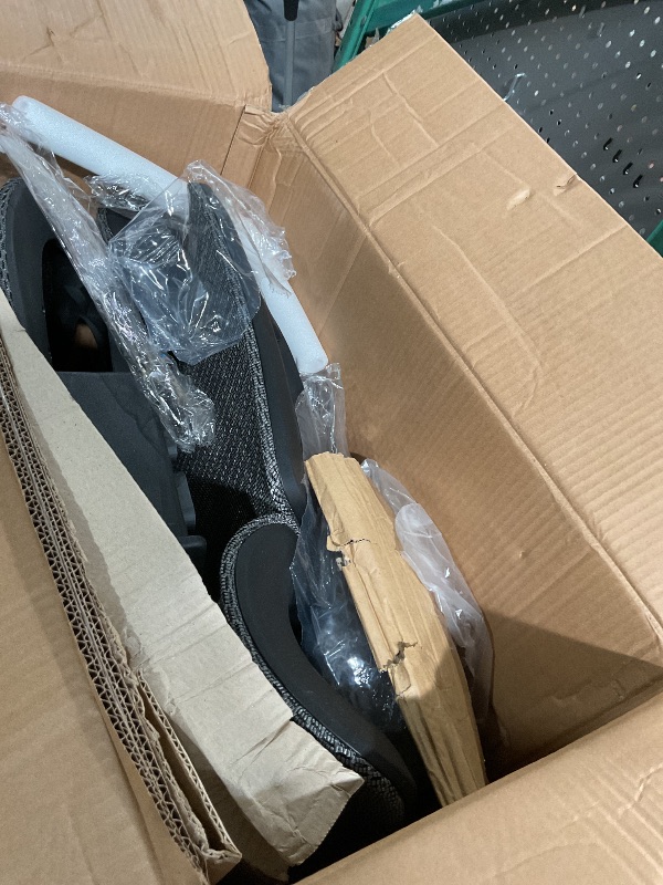 Photo 1 of **ITEM IS MISSING SOME PARTS**
Ergonomic Office Chair, Breathable Mesh with Adaptive Lumbar Support, 3D Headrest, Armrests, Retractable Footrest, and a Six-Position Adjustable Backrest, Black