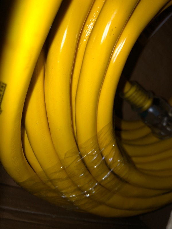 Photo 1 of 100 ft. 10/3 SJTW Outdoor Heavy-Duty Extension Cord with T-Blade Power Light Plug