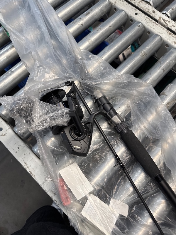 Photo 1 of (FAIR) PENN 12' Wrath II Fishing Rod and Spinning Reel Combo, Size 8000, Heavy Power, Moderate Fast Action, Corrosion-Resistant Graphite Construction, Lightweight and Durable