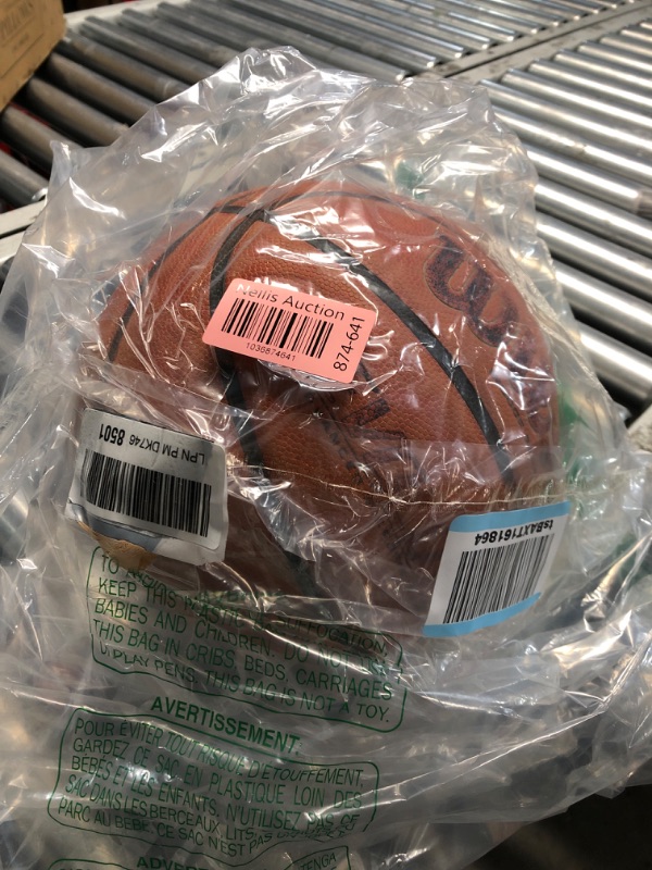 Photo 1 of **BAGGED** (USED/FADED) WILSON Evolution Indoor Game Basketball, Green, Size 7 - 29.5"