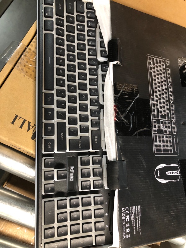 Photo 1 of RedThunder K10 Wireless Gaming Keyboard and Mouse Combo, RGB Backlit Rechargeable 3800mAh Battery, Mechanical Feel Anti-ghosting Keyboard with Pudding Keycaps + 7D 3200DPI Mice for PC Gamer (Black)