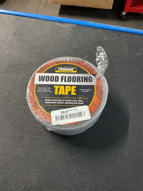 Photo 2 of "Titebond 16320 2" Wide Double Sided Wood Flooring Tape Roll, 40'", Black