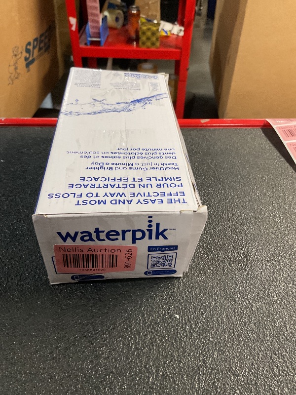 Photo 1 of Waterpik Cordless Pulse Rechargeable Portable Water Flosser for Teeth, Gums, Braces Care and Travel with 2 Flossing Tips, Waterproof, ADA Accepted, WF-20 Gray, Packaging May Vary