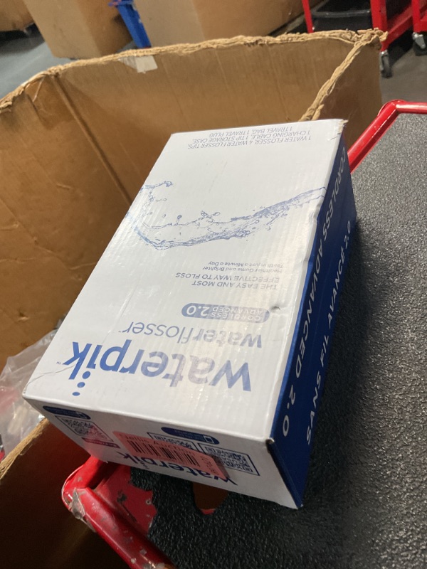 Photo 1 of Waterpik Cordless Advanced 2.0 Water Flosser For Teeth, Gums, Braces, Dental Care With Travel Bag and 4 Tips, ADA Accepted, Rechargeable, Portable, and Waterproof, Blue WP-583, Packaging May Vary