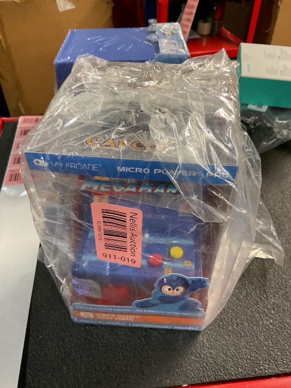 Photo 1 of My Arcade Mega Man Micro Player Pro: Mega Man Retro Gaming Console Titles 1 Through 6, Gifts for Kids and Adults, Video Game Collectibles, Full Color Screen