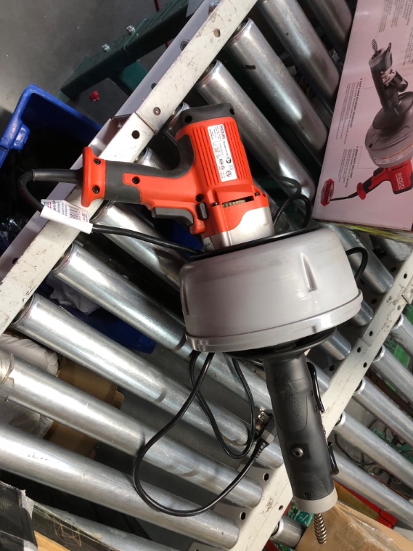 Photo 1 of ***USED - POWERS ON - UNABLE TO TEST FURTHER***
Ridgid K-45AF-5 Drain Cleaning Autofeed Snake Auger Machine with C-1 5/16 in. x 25 ft. Inner Core Cable
