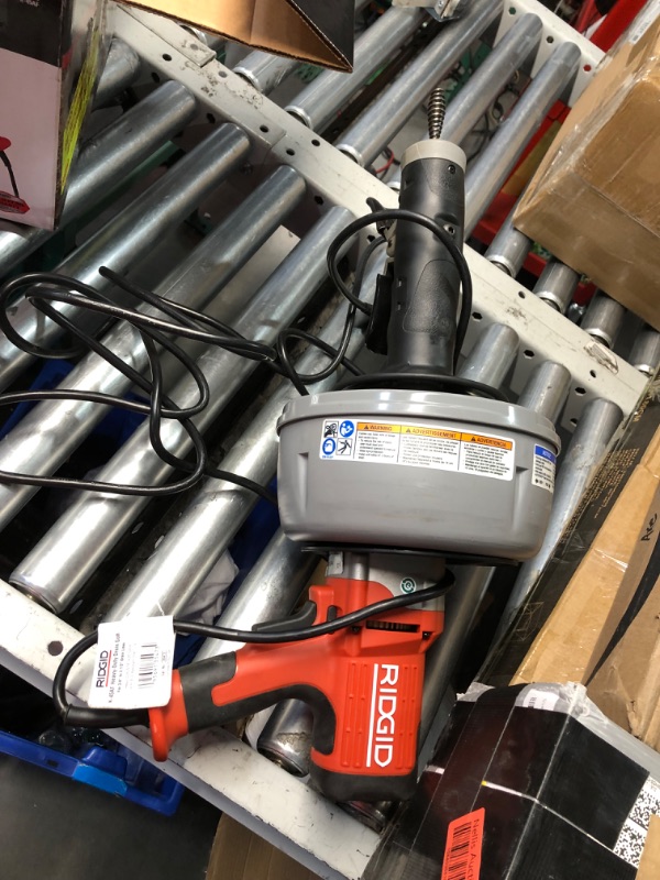 Photo 1 of ***USED - POWERS ON - UNABLE TO TEST FURTHER***
Ridgid K-45AF-5 Drain Cleaning Autofeed Snake Auger Machine with C-1 5/16 in. x 25 ft. Inner Core Cable