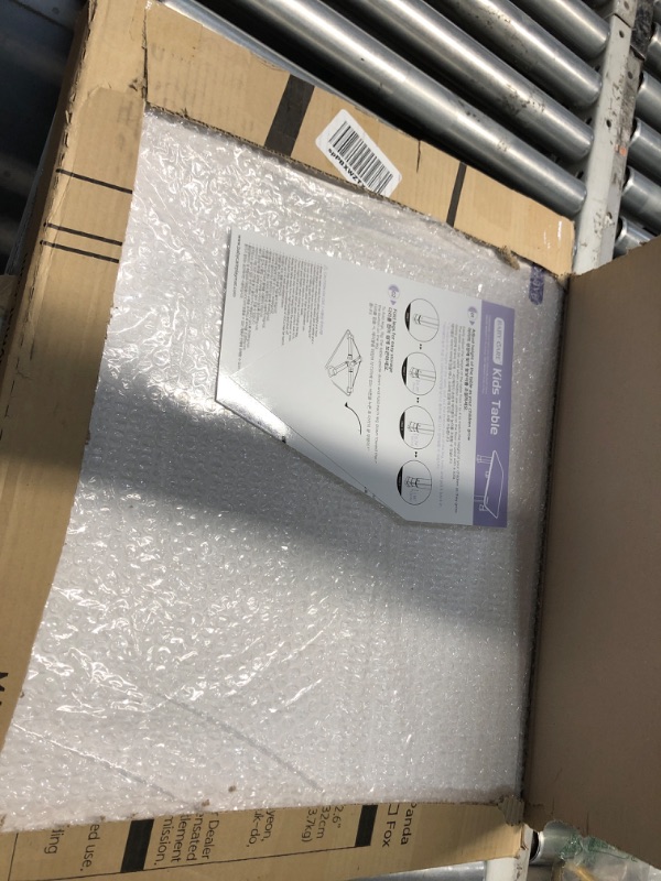 Photo 1 of **DAMAGED, TOP IS CUT FROM OPENING BOX**
Baby Care Kids Folding Floor Table w/Adjustable Heights - for Play, Reading, and Snack Time and More (White/Grey)