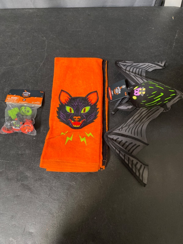 Photo 1 of 3 Item Seasonal & Party Supplies Bundle |24 Erasers, 22" Hanging Bat Halloween Decorative Prop, 2 Kitchen Towels
