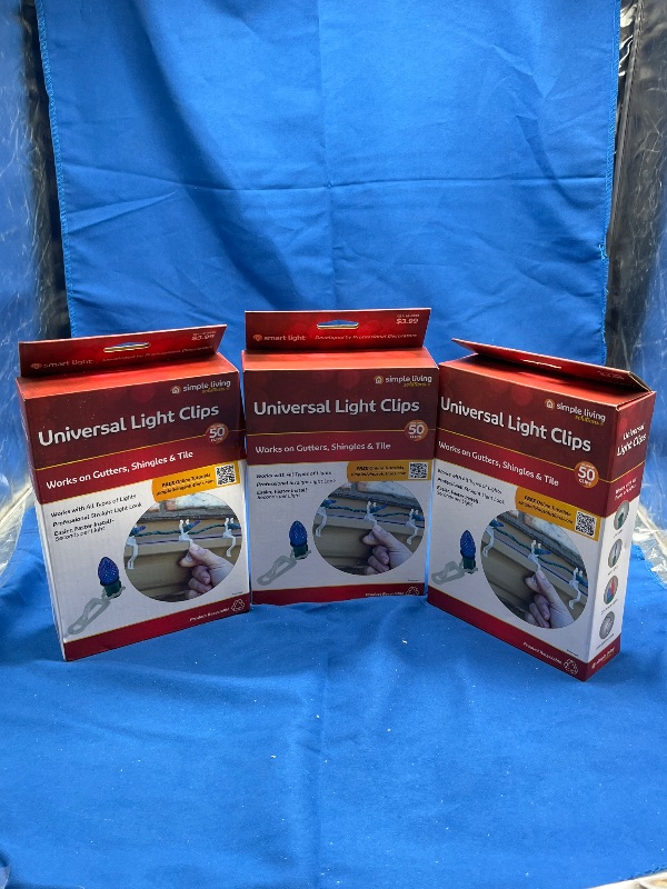 Photo 1 of Pack of 3 Clear Outdoor Universal Christmas Light Clips, Set of 50