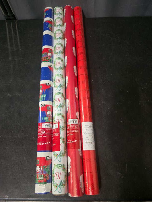 Photo 1 of 4 Pack Gift Wrap Blu, Joy, Snow Man All 50  Sq Ft , Red is 25 Sq Ft 
