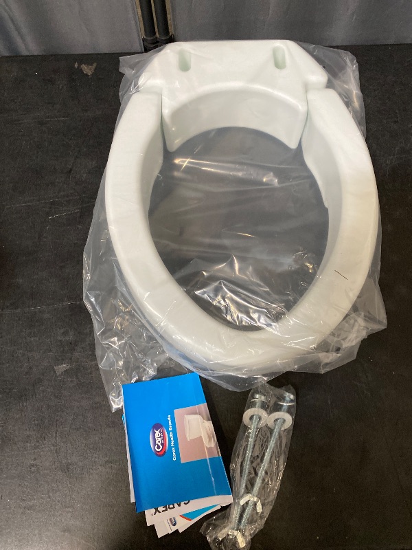 Photo 1 of Carex Elongated Hinged Toilet Seat Riser, Adds 3.5 Inches of Height to Toilet, 300 Pound Weight Capacity, Raised Toilet Seat