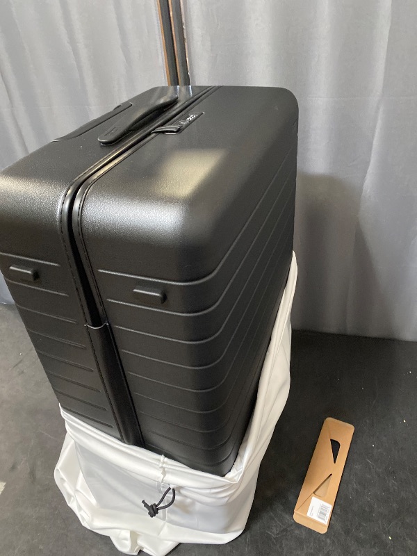Photo 1 of Away Large Checked Luggage, 29 Inch Hardside Suitcase with Spinner Wheels, Lightweight & Durable, TSA Lock, Jet Black