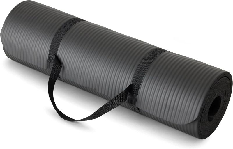 Photo 1 of Amazon Basics 1/2 Inch Extra Thick Exercise Yoga Mat with Carrying Strap, Cushioned Support, for Fitness and Gym Workouts