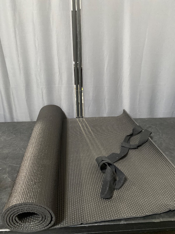 Photo 1 of Amazon Basics 1/2 Inch Extra Thick Exercise Yoga Mat with Carrying Strap, Cushioned Support, for Fitness and Gym Workouts