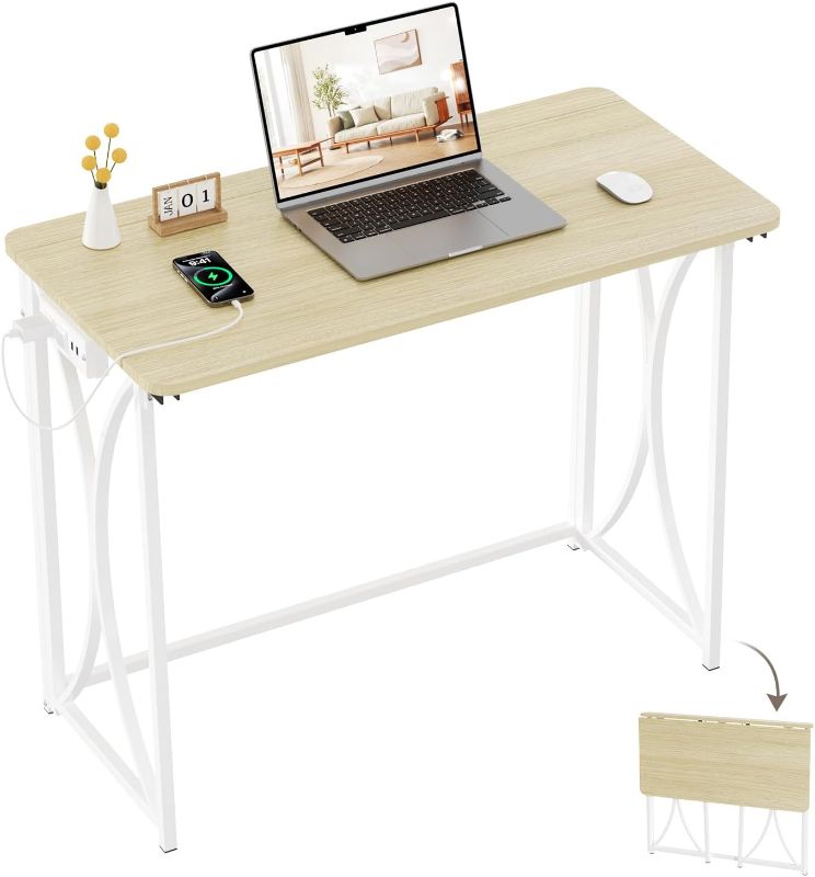 Photo 1 of Folding Table, 31.5" Small Desk for Bedroom with Power Outlet, Space Saving Foldable Computer Desk for Home Office, Easy Assembly, Beige