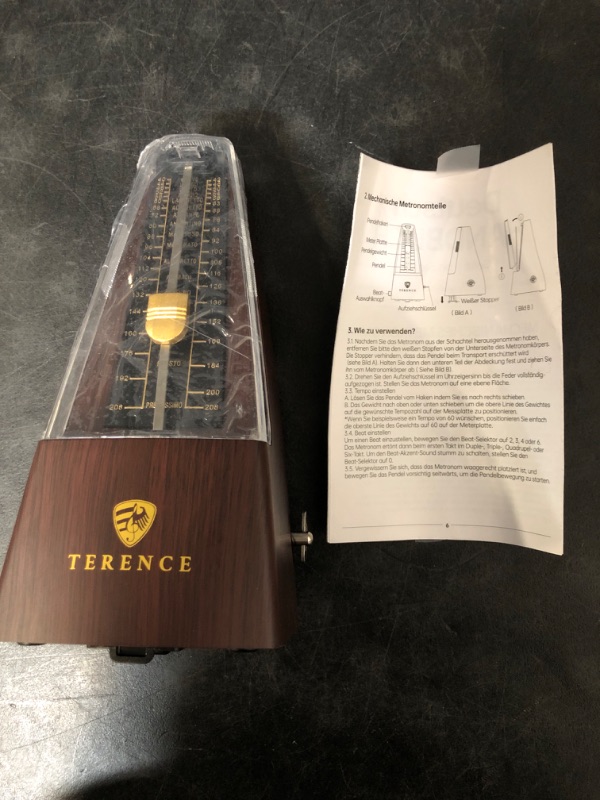 Photo 1 of Mechanical Metronomes for Piano Guitar Violin Bass Drum and Other Musical Instruments Loud Sound and High Precision Track Beat and Tempo for Beginners (Wood Grain)