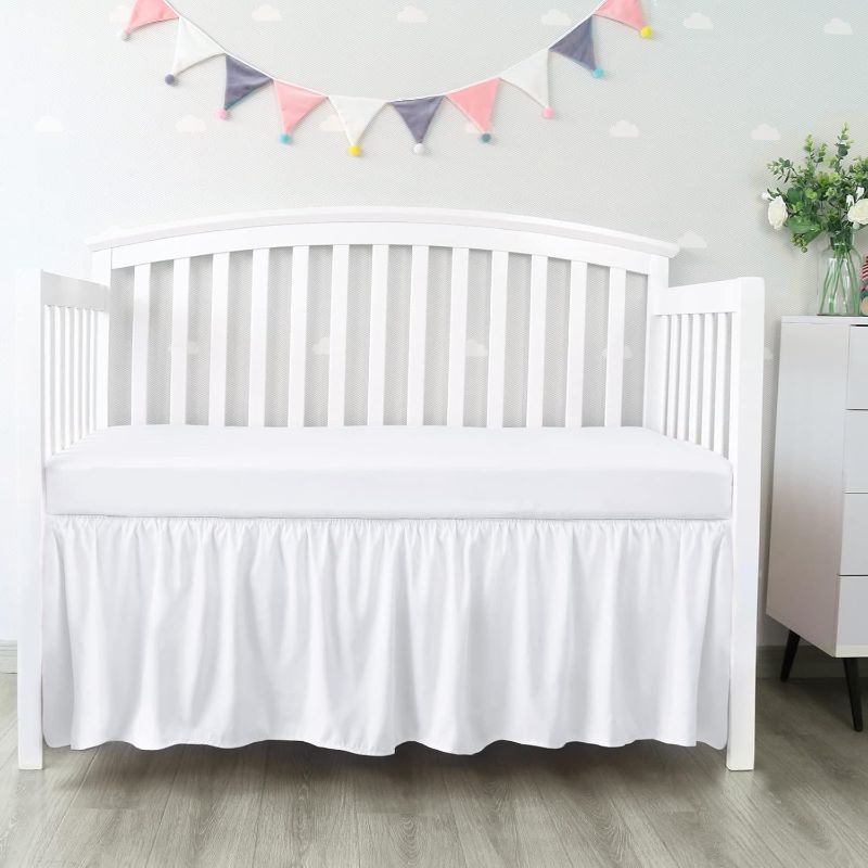 Photo 1 of Crib Bed Skirt 28” x 52” with 14” Drop Pleated Dust Ruffle for Baby Boys Girls Elastic Adjustable Fit Toddler Bedskirt Easy On/Off Soft Nursery Standard Crib Bedding Skirts Solid White Crib Skirt