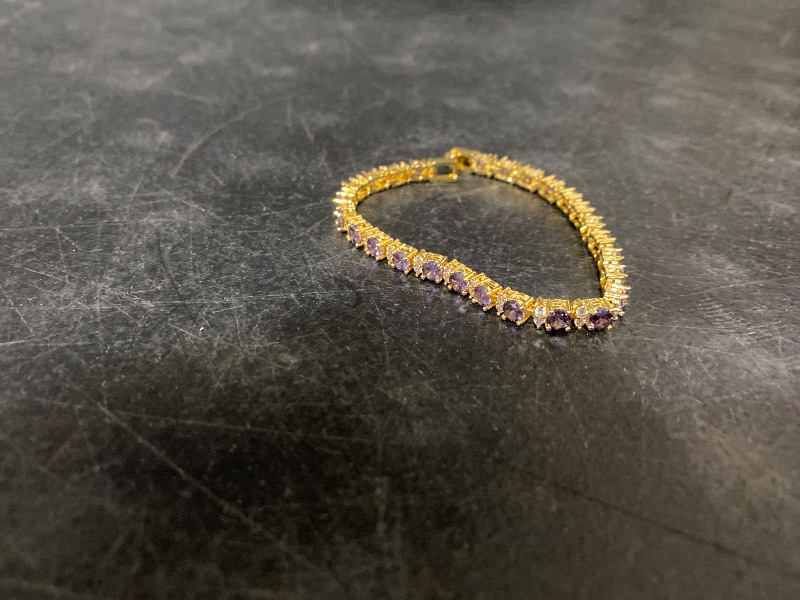 Photo 1 of RIZILIA Eternity Tennis Bracelet & Round Cut CZ in Yellow Gold Plated, 7"