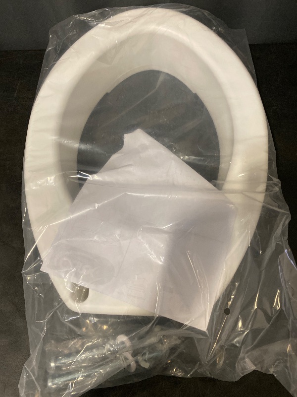 Photo 1 of Carex Toilet Seat Riser, Elongated Raised Toilet Seat Adds 3.5 inches to Toilet Height, for Assistance Bending or Sitting, 300 Pound Weight Capacity Toilet Riser